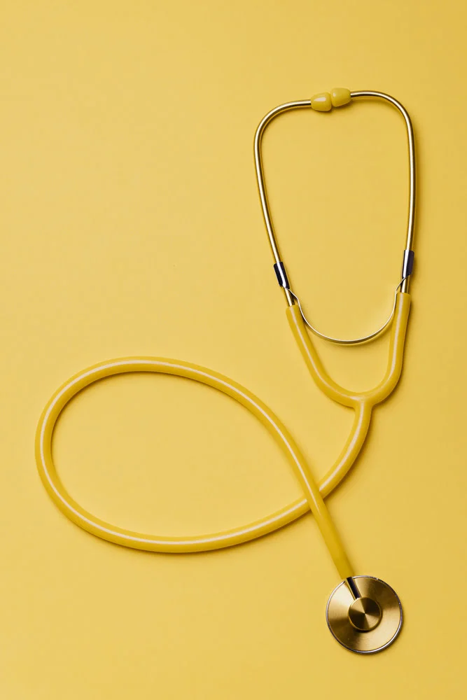 stethoscope yellow background